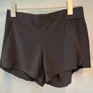 Black flowy RYU running shorts
